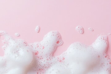 Beauty Product Foam Soap. Abstract background white soapy foam flowing texture. Shampoo foam with bubbles. Bubble surface isolated on pastel pink coral rose color. Suds. Facial cleanser. Froth Pattern