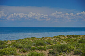 The shore of Lake Balkhash. Summer beach vacation.