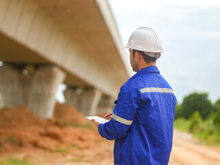 Engineer taking notes On Construction Site. Profession,construction site