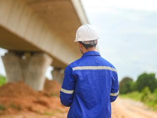 Engineer taking notes On Construction Site. Profession,construction site