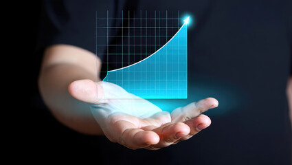 A Hand Presenting a Glowing Bar Graph with an Ascending Arrow on a Dark Background Representing Financial Growth and Positive Business Performance