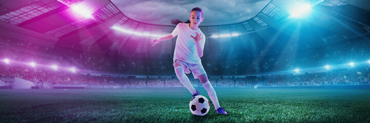 Young girl in white uniform skillfully dribbles the ball on a futuristic 3D-rendered glowing field....