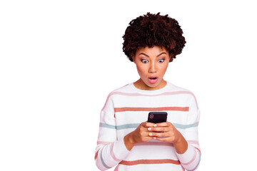Photo of horrified feared astonished girl negative in panic holding telephone with hands seeing...