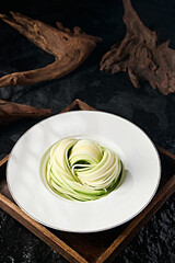 Chinese food delicious cold dish zucchini shreds with sauce