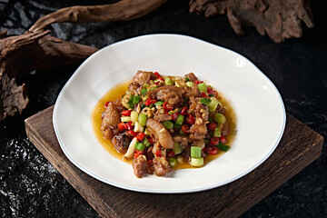 Delicious stir-fried pork trotters with rice pepper and garlic sprouts