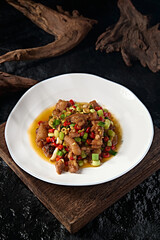 Delicious stir-fried pork trotters with rice pepper and garlic sprouts