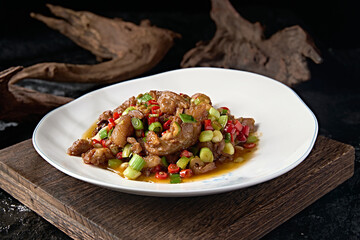 Delicious stir-fried pork trotters with rice pepper and garlic sprouts