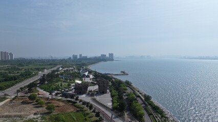 Fototapeta premium The skyline of Yeongjong Island, Incheon on a blue sky day, seen from the Seaside Park Yeongjong International City 