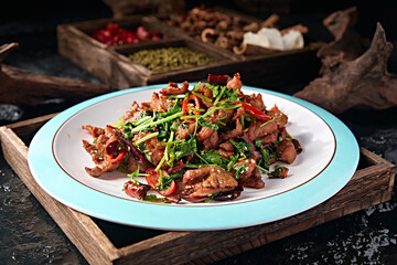 Chinese Hunan cuisine stir-fried beef with chili and coriander