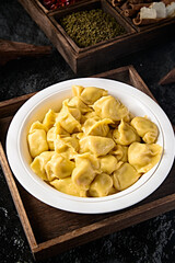 Whole grain cornmeal dumplings with pork and sauerkraut