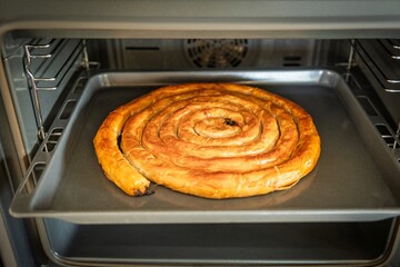 Experience the delightful aroma of freshly baked spiral pastry. This homemade treat is perfect for...