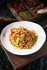 Chinese food Hunan style stir-fried pork tenderloin with pickled pepper and celery