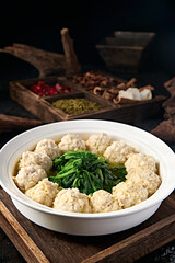 Chinese Huaiyang cuisine soup with vegetables and chopped pork