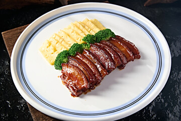 Chinese Cantonese delicious honey-glazed roast pork with pineapple