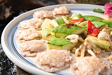 Chinese Cantonese cuisine Zucchini, white mushroom, lotus root slices, fried water chestnut and shrimp cakes