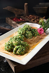 Chinese local cuisine fried wild vegetable meatballs