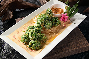 Chinese local cuisine fried wild vegetable meatballs
