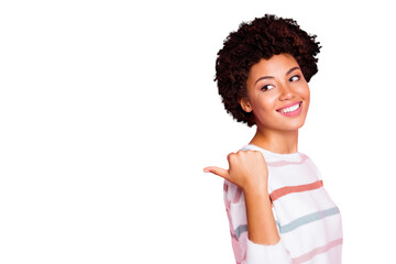 Photo of amazing dark skin wavy lady indicating finger empty space advising black friday low prices...