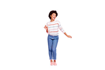 Full length photo of pretty dark skin lady at dancing party moving with favorite song rhythm wear...