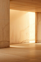A large, empty room with a lot of light shining through the windows