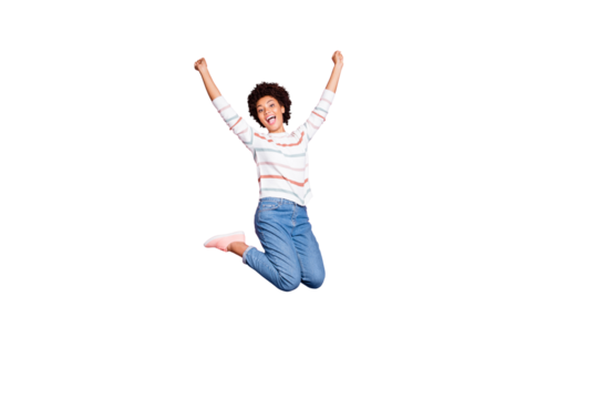 Full length body size photo of cheerful cute charming positive sweet pretty black millennial jumping up with happiness wearing jeans denim white striped sweater isolated pink pastel color background