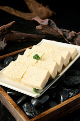 Hot pot ingredients: a plate of frozen tofu slices