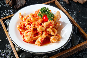 Exquisite cold dish: boneless chicken feet with lemon and spicy sauce
