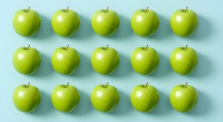 Green apples arranged in a grid pattern on a pastel background