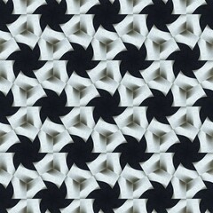 A beautiful pattern of white shapes on a dark background