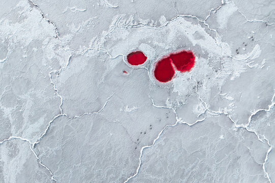 Aerial view of red salt pond in La Puna, Argentina