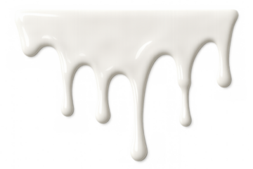 Creamy white liquid dripping down on a transparent background, perfect for food and beverage advertising