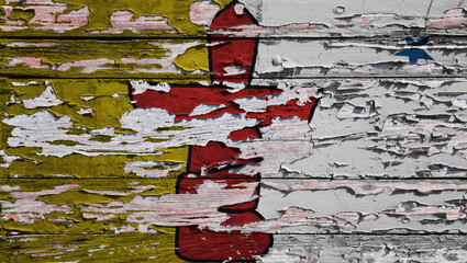 Flag of Nunavut painted on a wooden board