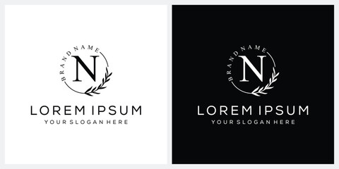 Initial letter N cosmetics fashion logo design, serif font graphic icon, leaves nature symbol concept
