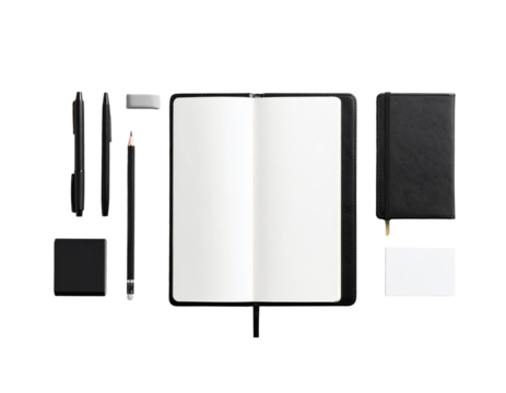 Books and notebooks and kindle on white desktop