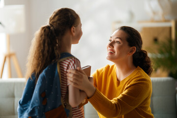 Happy family preparing for school