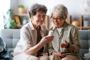 women are taking medication at home