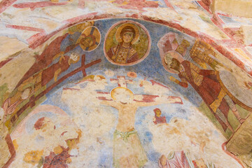 Demre, Antalya, Turkey - June 14 2025: Fragment of a fresco on the dome of the Church of St. Nicholas in Demre. Depictions of apostles, angels, and biblical scenes with bright colors and noticeable