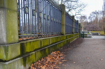 Decorative iron fence with Soviet symbols at the Soviet War Memorial in Treptower Park, Berlin,...