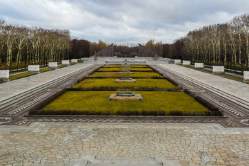 Wide symmetrical view of the Soviet War Memorial gardens in Treptower Park, Berlin, Germany, with...