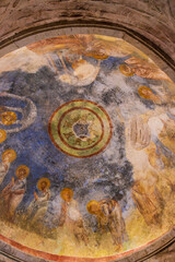 Demre, Antalya, Turkey - June 14 2025: Fragment of a fresco on the dome of the Church of St. Nicholas in Demre. Depictions of apostles, angels, and biblical scenes with bright colors and noticeable