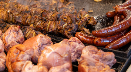 Large assortment of grilled sausages and kebabs at  Cracow christmas market