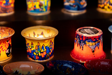 Christmas souvenirs - painted candle holders for sale at a traditional European Christmas market