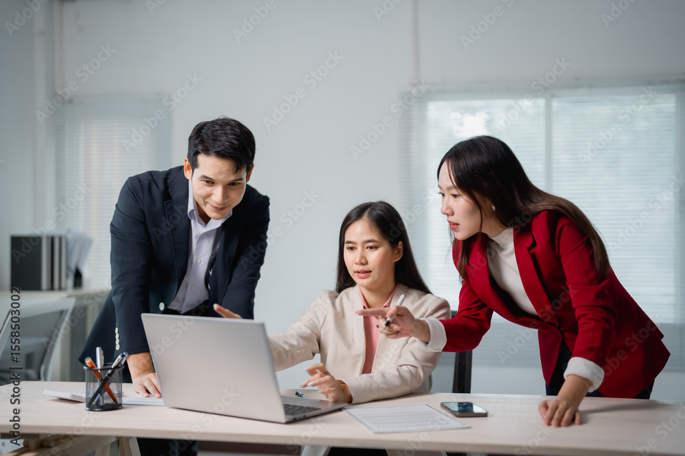 Poster three asian businesspeople discussing work while collaborating on a project, utilizing a laptop in a