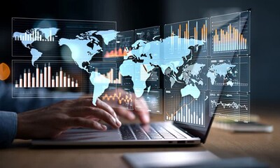 A person works on a laptop with holographic data visualizations of charts, graphs, and world maps floating above it - Powered by Adobe
