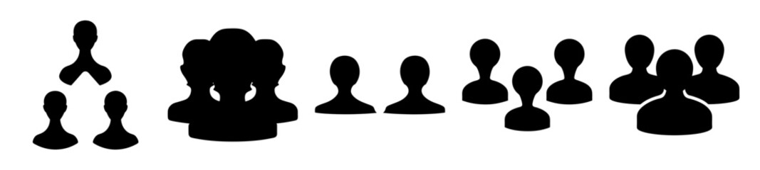Arrangement of Black Silhouetted Figures on a White Background Depicting Teamwork
