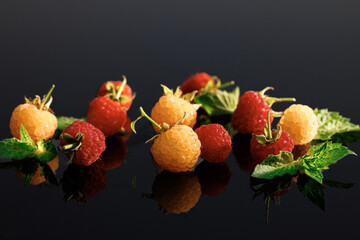 Sweet ripe fresh delicious raspberry, summer berry, organic food, vitamins. Raspberry with leaves....