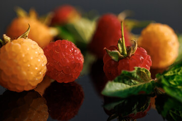 Close up of Fresh red ripe raspberries. Sweet ripe fresh delicious raspberry, summer berry, organic...