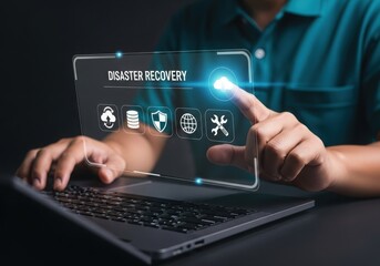 Man using disaster recovery interface on laptop computer