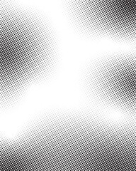 Abstract halftone dot pattern creating a gradient effect, ideal for backgrounds, textures, and graphic design elements.