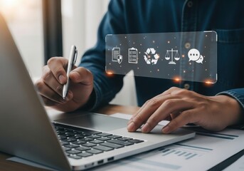 Man using laptop with environmental icons floating above it